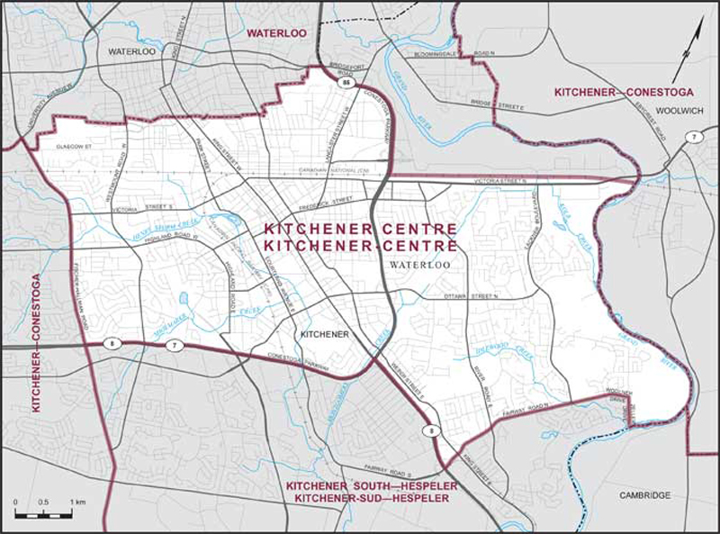 Consisting of that part of the Regional Municipality of Waterloo comprised of that part of the City of Kitchener described as follows: commencing at the intersection of Conestoga Parkway with Fischer-Hallman Road; thence generally northwesterly along said road to the northerly limit of said city; thence generally northeasterly along said limit to Conestoga Parkway; thence easterly and southeasterly along said parkway to the Canadian National Railway; thence northeasterly along said railway to the easterly limit of said city; thence generally southeasterly along said limit (Grand River) to the southeasterly production of Zeller Drive; thence northwesterly along said production and Zeller Drive to Woolner Drive; thence generally southwesterly along said drive, Fairway Road North and Fairway Road South to Highway No. 8; thence northwesterly along said highway to Conestoga Parkway; thence generally westerly along said parkway to the point of commencement. KITCHENER CENTRE